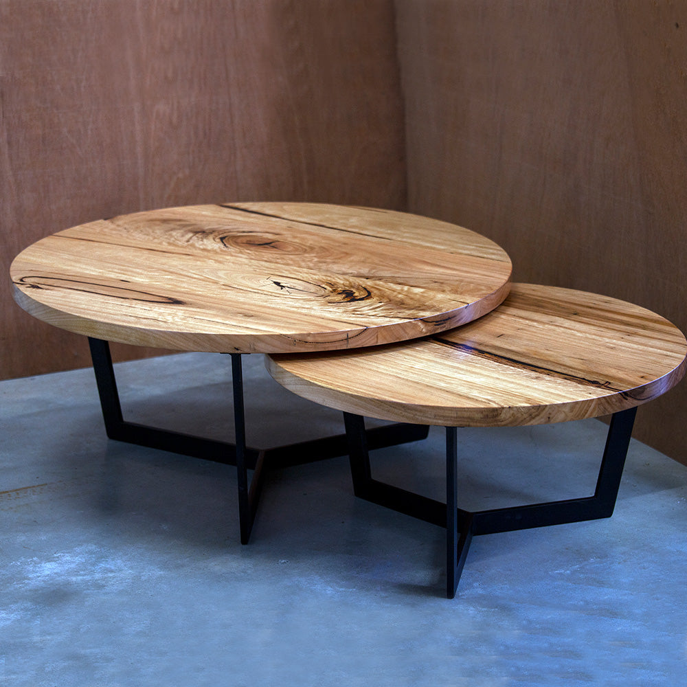 Nesting Coffee Tables with metal tri legs.